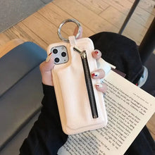 Load image into Gallery viewer, Luxury zipper PU leather wallet case for iPhone, featuring elegant design and functionality, displayed on a book and held by a hand.