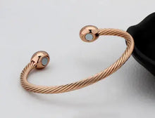 Load image into Gallery viewer, Rose gold magnetic bracelet ring with chic design and therapeutic benefits.