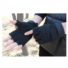 Load image into Gallery viewer, Person wearing newly designed tactical gloves demonstrating superior anti-slip grip outdoors