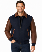 Cargar imagen en el visor de la galería, REED Men's Executive Varsity Jacket with cowhide leather sleeves and wool body, union-made in the USA, worn by a model.