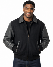 Cargar imagen en el visor de la galería, REED Men's Executive Varsity Jacket with cowhide leather sleeves and wool body, union-made in the USA, worn by a model.