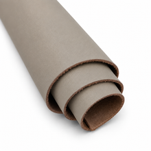 Load image into Gallery viewer, Roll of taupe leather on a white background