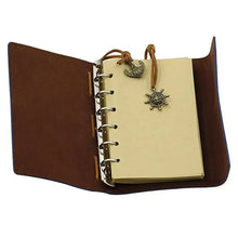 Load image into Gallery viewer, Anchor-Faux Leather Cover Notebook with anchor charm, open to show lined pages, perfect for capturing ideas and dreams in style.