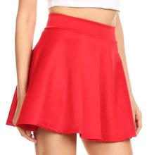 Load image into Gallery viewer, Model wearing a red women's flared mini skater skirt, casual style, versatile and stretchy fit, made in USA.