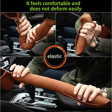 Load image into Gallery viewer, Man demonstrating elastic vegan leather car seat gap filler in car interior.