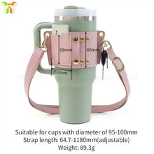 Load image into Gallery viewer, PU Leather Coffee Cup Carrier Cover with adjustable pink strap, shown on a green mug. Suitable for 95-100mm cups, weight 89.3g.