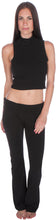 Load image into Gallery viewer, Woman wearing a black mock neck sleeveless crop top paired with matching pants, showcasing a stylish and modern fashion look.