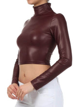 Load image into Gallery viewer, Matte liquid mock neck turtleneck long sleeve crop top in burgundy, worn with white jeans, highlighting USA manufacturing.
