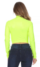 Load image into Gallery viewer, Back view of woman wearing a neon green Matte Liquid Mock Neck Turtleneck Long Sleeve Crop Top with dark jeans.