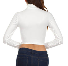 Load image into Gallery viewer, Back view of a white matte liquid mock neck turtleneck long sleeve crop top worn by a woman, paired with dark jeans.