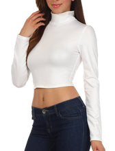 Load image into Gallery viewer, Matte Liquid Mock Neck Turtleneck Long Sleeve Crop Top in white, styled with dark jeans, perfect for trendy casual wear.