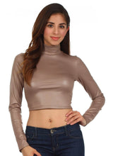 Load image into Gallery viewer, Woman wearing a matte liquid mock neck turtleneck long sleeve crop top, showcasing its sleek design and fit. Made in USA. Fashionable attire.