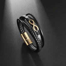 Cargar imagen en el visor de la galería, Classic hand woven multi-layered vegan leather bracelet with gold infinity charm, perfect for men's style and sophistication.