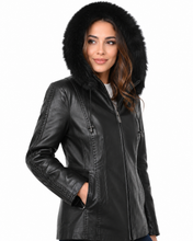 Load image into Gallery viewer, Woman wearing a black leather jacket with fur hood on a white background