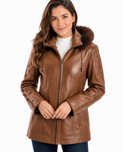Load image into Gallery viewer, Woman wearing a brown leather jacket with fur hood on a white background