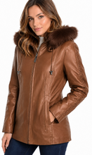 Load image into Gallery viewer, Woman wearing a brown leather jacket with fur hood on a white background