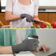 Load image into Gallery viewer, Two hands wearing compression arthritis gloves while cooking and holding a coffee cup, providing pain relief and support for daily activities.