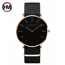 Load image into Gallery viewer, Luxurious rose gold leather watch with a minimalist black dial and genuine leather strap, versatile for casual and formal wear.