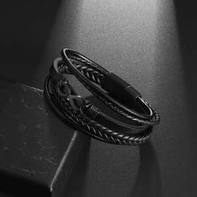 Cargar imagen en el visor de la galería, Classic hand woven multi-layered vegan leather bracelet in sleek black, perfect for elevating men's style with sophistication.