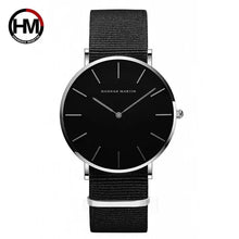 Load image into Gallery viewer, Sleek black dial watch with minimalist design, featuring a durable black strap. Ideal for both casual and formal wear.