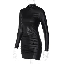 Cargar imagen en el visor de la galería, Be So Faux Real Faux Leather Ruched Mini Dress, black high-neck, long sleeves, sleek design, perfect for night out, edgy elegance