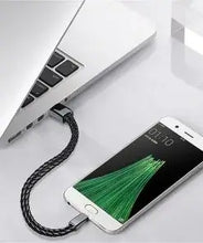 Cargar imagen en el visor de la galería, USB leather charging braided bracelet connecting a smartphone to a laptop for convenient charging on the go.