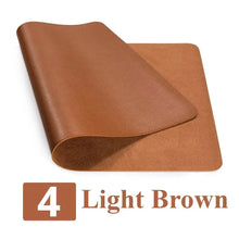 Load image into Gallery viewer, Light brown leather suede desk mat with elegant design, perfect for protecting and upgrading your workspace style and comfort.