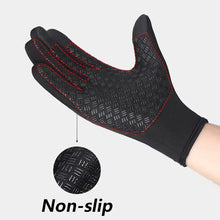 Cargar imagen en el visor de la galería, Waterproof winter glove with non-slip grip, designed for touchscreen use, features black textured palm and red stitching.