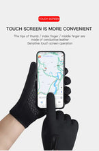 Load image into Gallery viewer, Black thermal waterproof gloves demonstrating touchscreen capabilities, highlighting convenience for outdoor use.