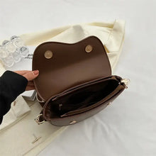 Load image into Gallery viewer, Open small leather chain shoulder bag showcasing interior design