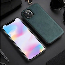Load image into Gallery viewer, Leather iPhone case in stylish green, luxury hybrid design, PU leather with TPU frame, protective and elegant, on black background.