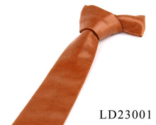 Load image into Gallery viewer, Brown polyurethane leather tie for men, vegan and imported, with LD23001 label.