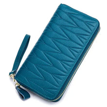 Load image into Gallery viewer, Teal leather female travel purse with zipper and wrist strap, ideal for organizing essentials like passport and cards in style.