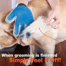 Load image into Gallery viewer, Amazing Grooming Gloves brushing dog with fur being peeled off, showcasing easy hair removal feature.