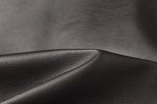 Load image into Gallery viewer, Close-up of genuine leather fabric texture in dark brown color, perfect for luxury garments like bomber jackets.
