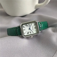 Load image into Gallery viewer, Retro Women's Classic Quartz Watch with Green Vegan Leather Strap on a Silky Fabric Background