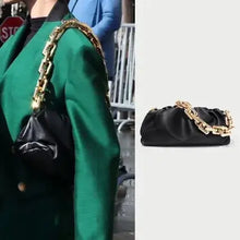 Load image into Gallery viewer, Soft Leather Women's Cloud Bag with gold chain, versatile hobo style; elegant, luxurious accessory on dressed-up woman in green coat.