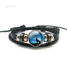 Load image into Gallery viewer, Handmade leather bracelet with wolf and full moon design, featuring braided bands and premium materials for a wild, stylish look.