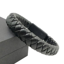 Charger l'image dans la galerie, Vegan leather phone data cable bracelet with black braided design, offering portable mini micro USB charging functionality.
