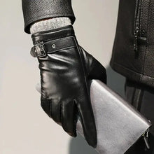 Load image into Gallery viewer, Men's winter leather gloves in black, featuring a stylish buckle, perfect for warmth and sophistication, holding a wallet.