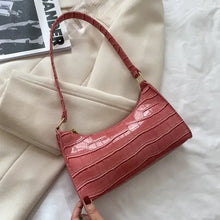 Cargar imagen en el visor de la galería, Elegant vegan leather shoulder bag with crocodile pattern in pink, perfect for stylish versatility and sophistication.