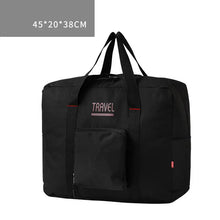 Load image into Gallery viewer, Large capacity black foldable canvas travel bag for men and women, perfect for luggage and storage, shown with dimensions 45x20x38 cm.