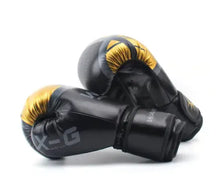 Load image into Gallery viewer, Black and gold adults kickboxing gloves with adjustable wrist strap for comfort and durability, made from premium PU leather.