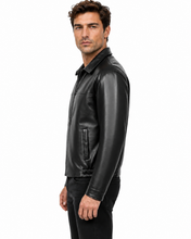 Charger l'image dans la galerie, A man wearing a black leather jacket, shown in profile against a plain white background.