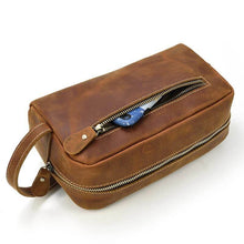 Load image into Gallery viewer, The Wanderer Toiletry Bag | Genuine Leather Toiletry Bag with durable zippers, front pocket, and handle for travelers.