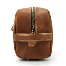Load image into Gallery viewer, The Wanderer Toiletry Bag | Genuine Leather Toiletry Bag shown from side view, featuring durable leather and sturdy zipper.