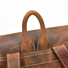 Load image into Gallery viewer, Close-up of The Hagen Backpack | Vintage Leather Backpack handle in genuine cowhide leather with natural creases.