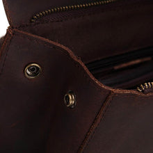 Load image into Gallery viewer, Close-up of The Gyda Backpack | Vintage Leather Travel Backpack interior showing quality leather and secure hardware.