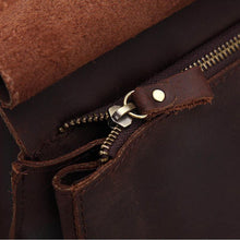 Load image into Gallery viewer, Close-up of The Gyda Backpack | Vintage Leather Travel Backpack showcasing zipper details and premium leather texture.