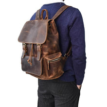 Load image into Gallery viewer, The Hagen Backpack | Vintage Leather Backpack in genuine cowhide leather with natural creases and durable design on a person's back.